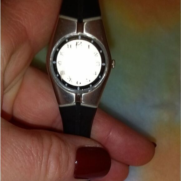 Ladies Armitron with a black rubber band and round silver face - Picture 7 of 9